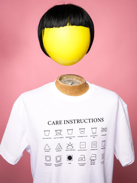 Human Care Instructions | Unisex T-Shirt